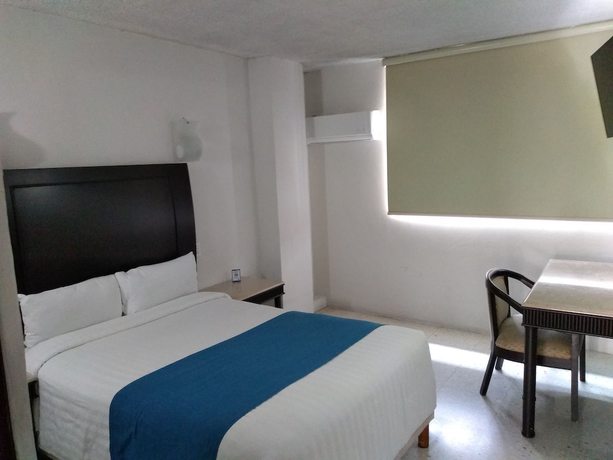 Imagen de la habitación del Hotel Rosgaud. Foto 9