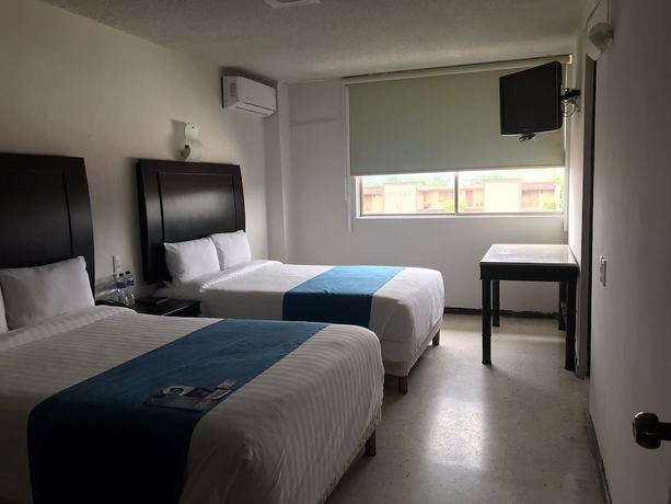 Imagen de la habitación del Hotel Rosgaud. Foto 16