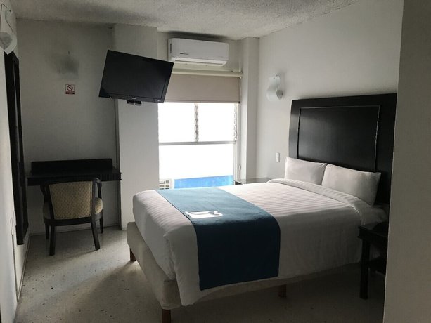Imagen de la habitación del Hotel Rosgaud. Foto 17