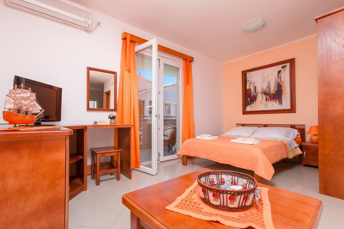 Imagen de la habitación del Hotel Rosic Apartments. Foto 14