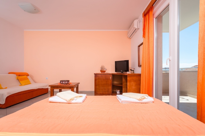 Imagen de la habitación del Hotel Rosic Apartments. Foto 15