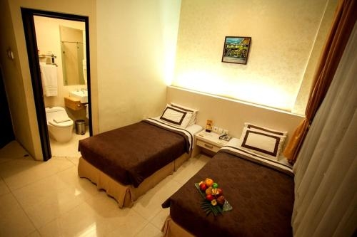Imagen de la habitación del Hotel Ros-in Yogyakarta. Foto 6