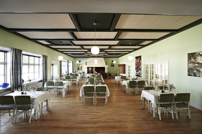 Imagen del bar/restaurante del Hotel R&oslash;dvig Kro Og Badehotel. Foto 5