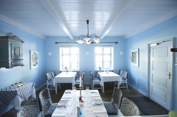 Imagen del bar/restaurante del Hotel R&oslash;dvig Kro Og Badehotel. Foto 6