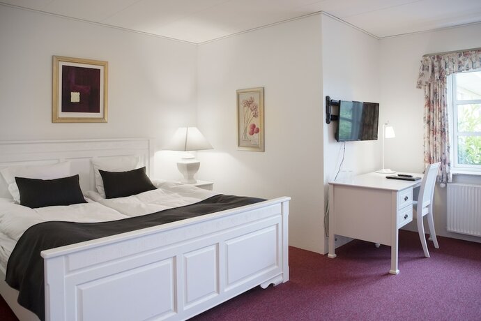 Imagen de la habitación del Hotel R&oslash;nnes. Foto 24