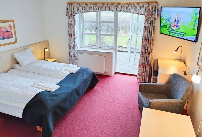 Imagen de la habitación del Hotel R&oslash;nnes. Foto 33