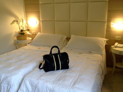 Imagen de la habitación del Hotel Rosmarina. Foto 5