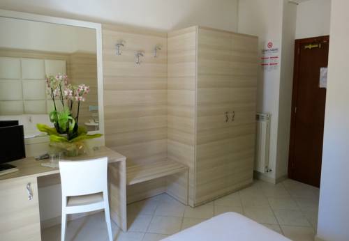 Imagen de la habitación del Hotel Rosmarina. Foto 16