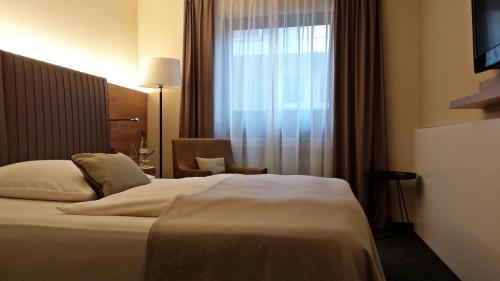 Imagen de la habitación del Hotel Ross, Schweinfurt. Foto 8