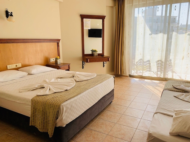 Imagen de la habitación del Hotel Rosy Suites. Foto 5
