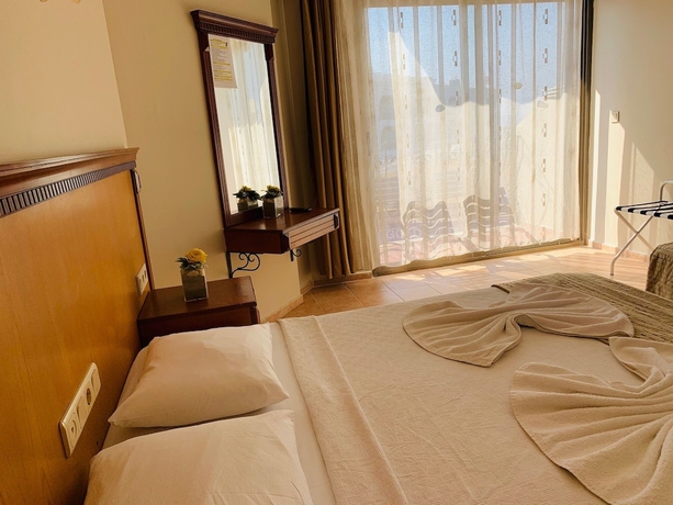 Imagen de la habitación del Hotel Rosy Suites. Foto 6