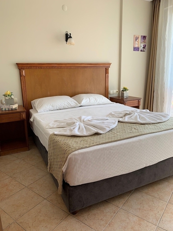 Imagen de la habitación del Hotel Rosy Suites. Foto 10