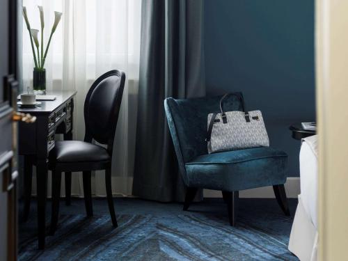 Imagen de la habitación del Hotel Rotary Geneva – Mgallery. Foto 18