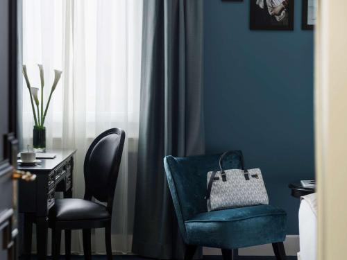 Imagen de la habitación del Hotel Rotary Geneva – Mgallery. Foto 19