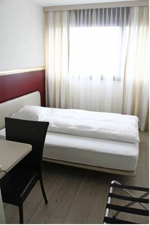 Imagen de la habitación del Hotel Rotonda, Minusio. Foto 16