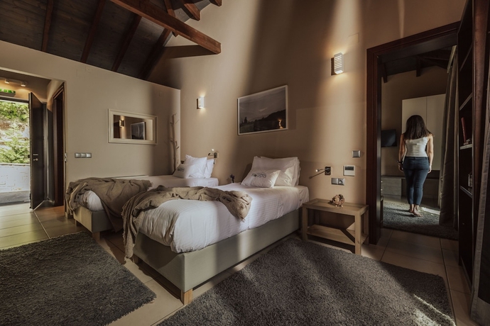 Imagen de la habitación del Hotel Rouista Tzoumerka Resort. Foto 12