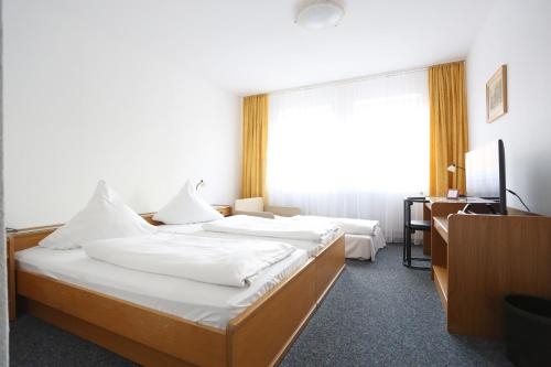 Imagen de la habitación del Hotel R&ouml;merstadt. Foto 10