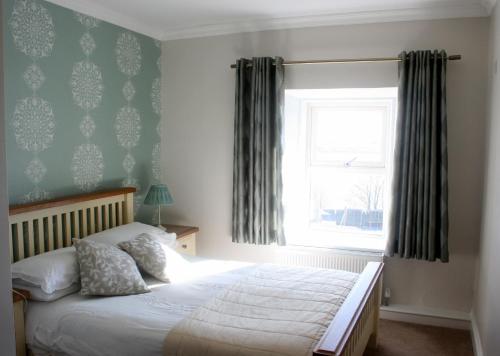 Imagen de la habitación del Hotel Roundstone House. Foto 4