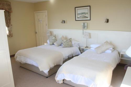 Imagen de la habitación del Hotel Roundstone House. Foto 5