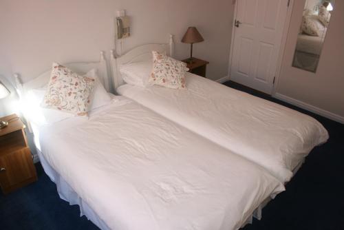Imagen de la habitación del Hotel Roundstone House. Foto 6