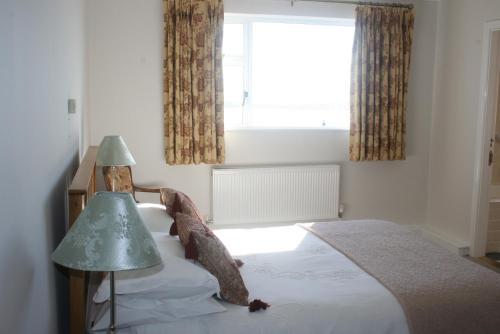 Imagen de la habitación del Hotel Roundstone House. Foto 8