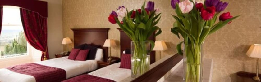 Imagen de la habitación del Hotel Roundthorn Country House and Luxury Apartments. Foto 2