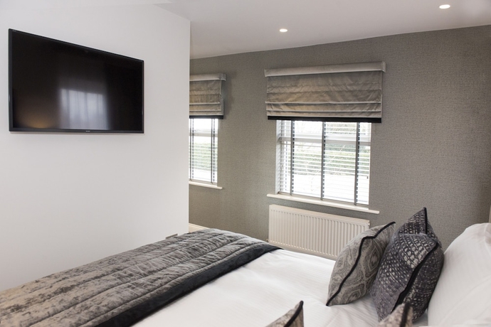 Imagen de la habitación del Hotel Roundthorn Country House and Luxury Apartments. Foto 6