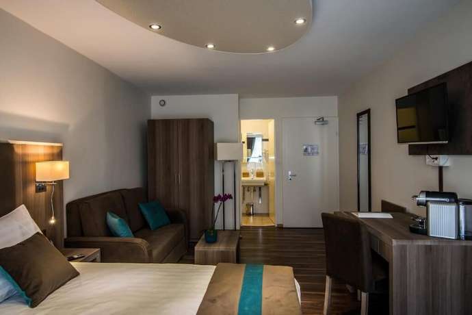 Imagen de la habitación del Hotel Rousseau Geneva. Foto 3