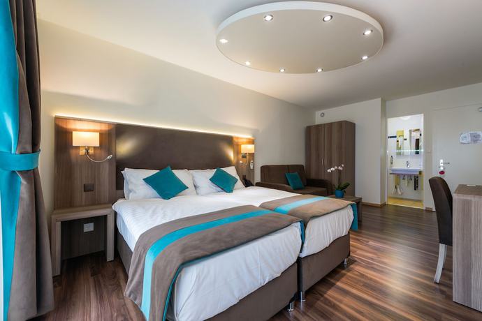 Imagen de la habitación del Hotel Rousseau Geneva. Foto 5