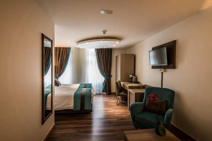 Imagen de la habitación del Hotel Rousseau Geneva. Foto 11