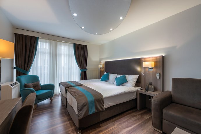 Imagen de la habitación del Hotel Rousseau Geneva. Foto 15