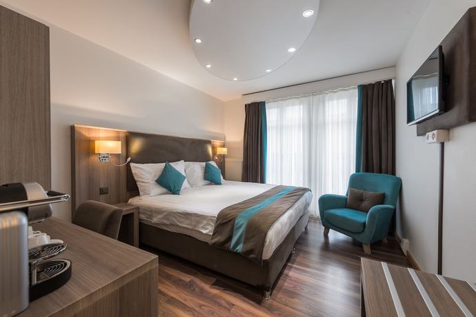 Imagen de la habitación del Hotel Rousseau Geneva. Foto 16