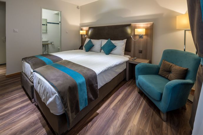 Imagen de la habitación del Hotel Rousseau Geneva. Foto 17