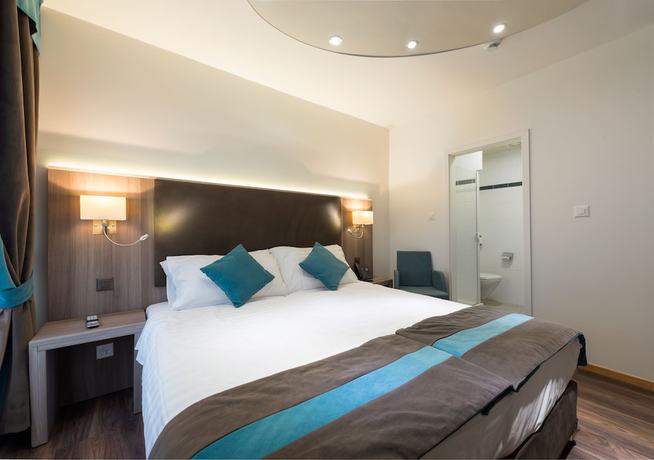 Imagen de la habitación del Hotel Rousseau Geneva. Foto 19