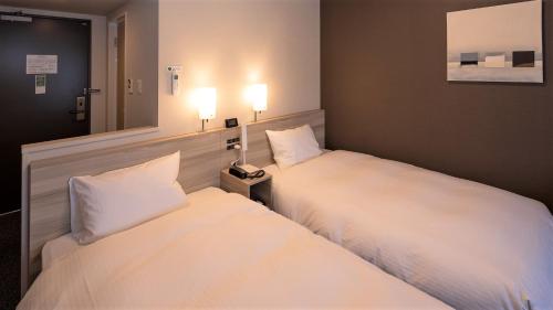 Imagen de la habitación del Hotel Route Inn Grand Nagoya Fujigaoka Ekimae. Foto 19