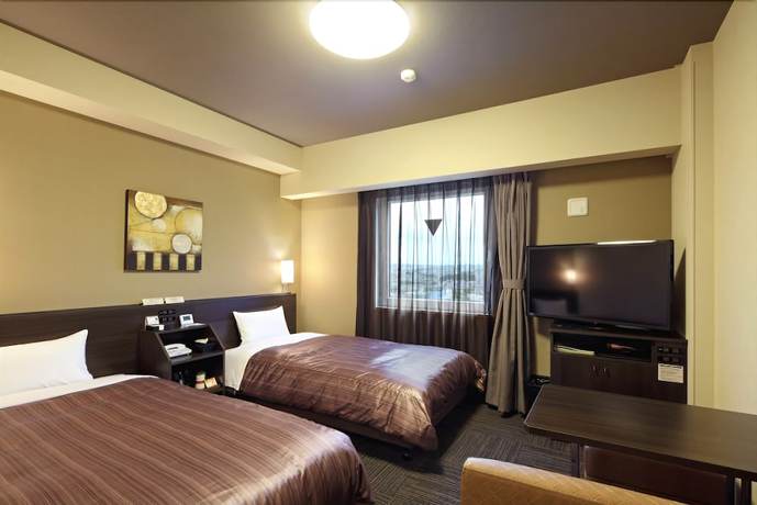 Imagen de la habitación del Hotel Route Inn Higashi Hiroshima Saijo Ekimae. Foto 3