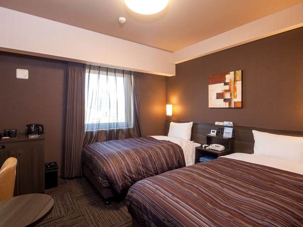 Imagen de la habitación del Hotel Route Inn Higashi Hiroshima Saijo Ekimae. Foto 6