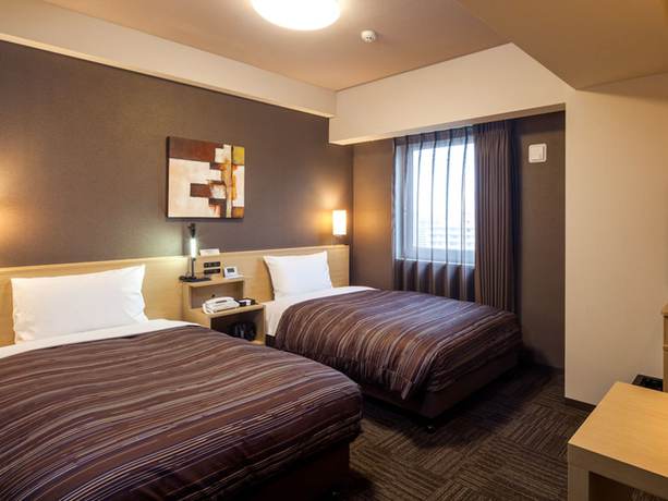Imagen de la habitación del Hotel Route Inn Higashi Hiroshima Saijo Ekimae. Foto 7