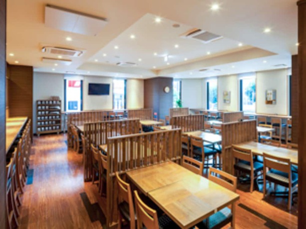 Imagen del bar/restaurante del Hotel Route Inn Higashi Hiroshima Saijo Ekimae. Foto 2