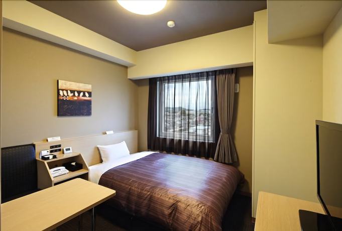 Imagen de la habitación del Hotel Route Inn Higashi Hiroshima Saijo Ekimae. Foto 8