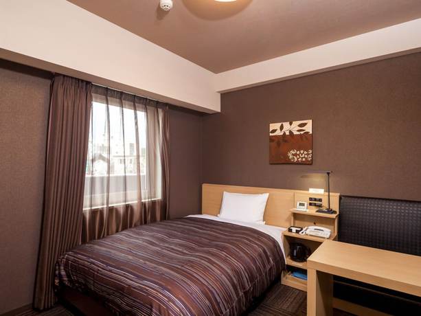 Imagen de la habitación del Hotel Route Inn Higashi Hiroshima Saijo Ekimae. Foto 9
