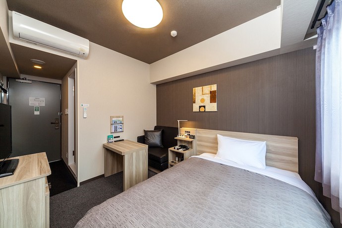 Imagen de la habitación del Hotel Route Inn Mihara Ekimae. Foto 11
