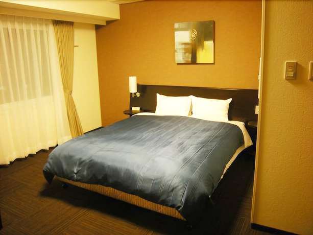 Imagen de la habitación del Hotel Route Inn Miyazaki Tachibana Dori. Foto 12