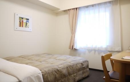 Imagen de la habitación del Hotel Route Inn Naha Tomariko. Foto 4
