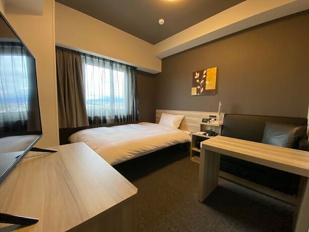 Imagen de la habitación del Hotel Route Inn Osaka Izumifuchu. Foto 11