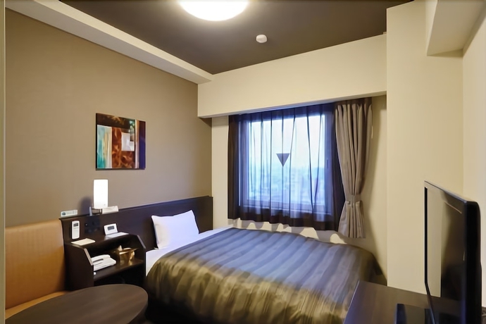 Imagen de la habitación del Hotel Route Inn Toyota Motomachi. Foto 12