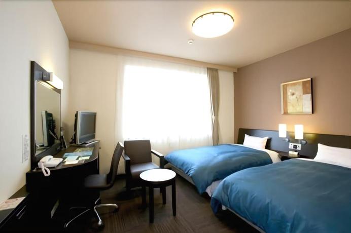 Imagen de la habitación del Hotel Route Inn Tsuruoka Ekimae. Foto 9