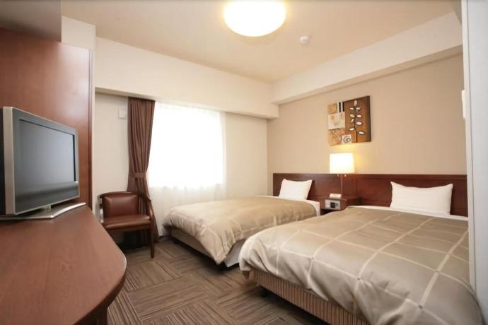 Imagen de la habitación del Hotel Route Inn Tsuruoka Ekimae. Foto 13