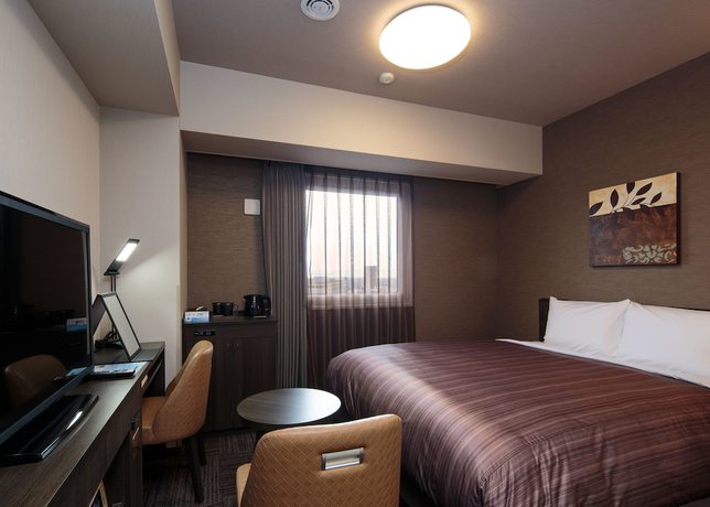 Imagen de la habitación del Hotel Route-Inn Takaoka Ekimae. Foto 7