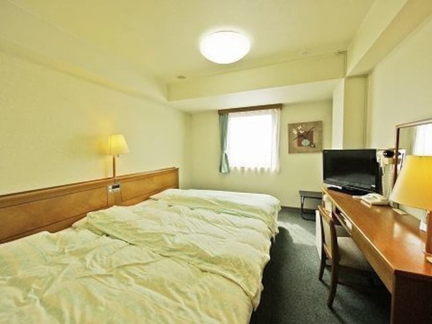 Imagen de la habitación del Hotel Route-Inn Yokkaichi. Foto 6